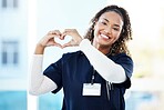 Doctor, portrait or heart hands in hospital wellness, medicine trust or medical support in life insurance, help or vote. Smile, happy or nurse with love gesture in healthcare, emoji or woman security