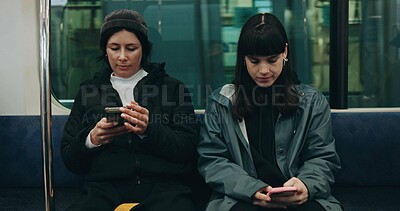 Buy stock photo Women, travel and train with friends, smartphone and relax with digital app, online chatting and social media. Search internet, transportation and people with cellphone, website information or typing