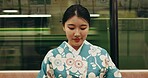 Japanese woman, happy and travel by train in kimono and public transport on metro bullet in city. Person, journey or traditional clothes in fast vehicle on weekend or commute in tokyo on adventure