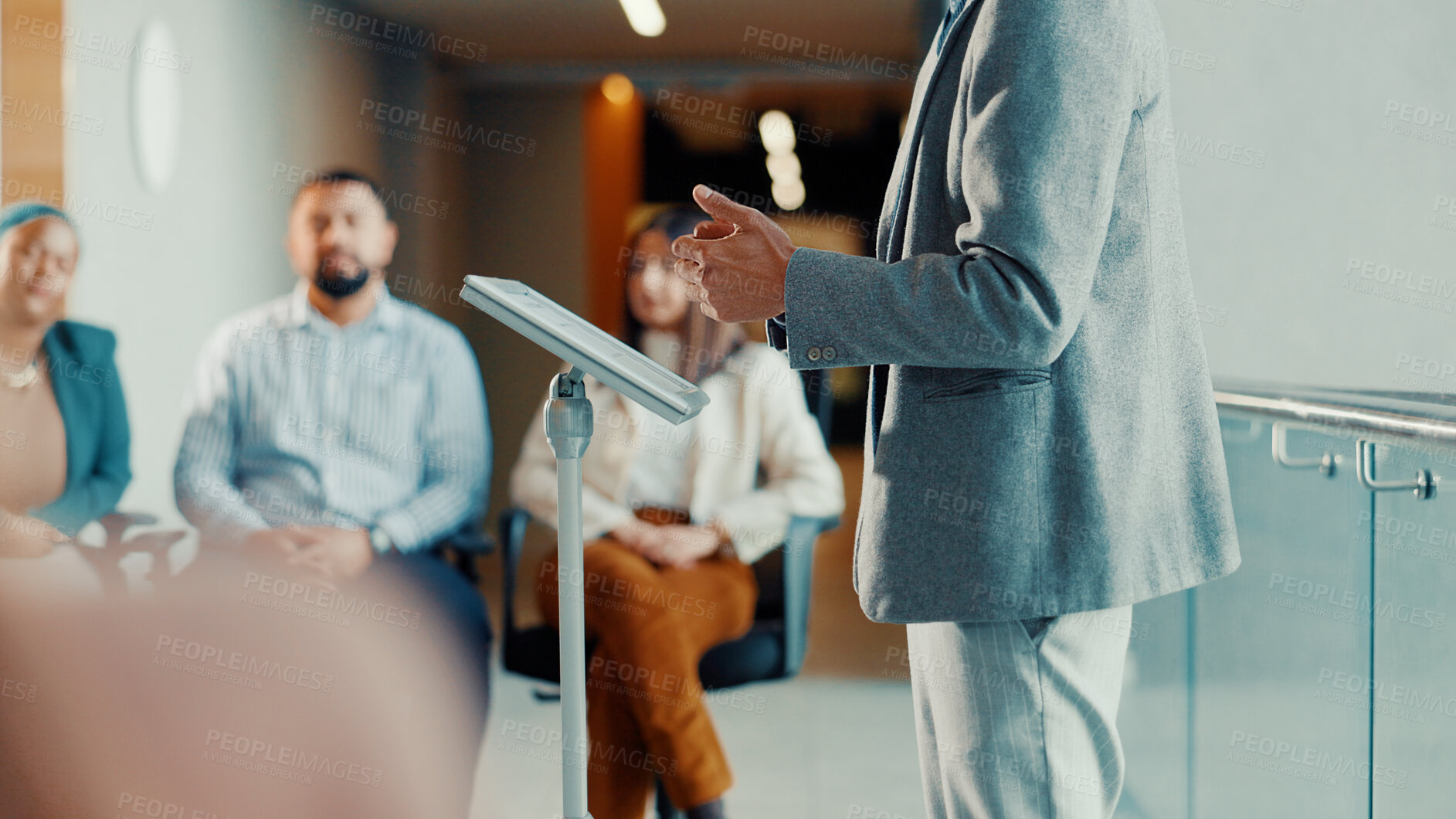 Buy stock photo Podium, speaker and hands with audience at conference, workshop or symposium for skill development. Corporate talk, presenter person with discussion or keynote speech at upskill seminar in business