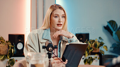 Buy stock photo Woman, tablet and listen with mic in studio for interview, audio broadcast or live streaming chat. Presenter, tech and question celebrity in talk show, target audience or information on media podcast