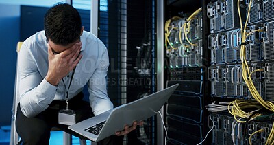 Buy stock photo Frustrated man, mistake or stress with laptop in server room for network failure or system error. Male person, IT technician or headache with anxiety on computer for security fault or troubleshooting