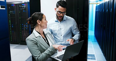 Buy stock photo Server room, team and people with laptop for discussion, diagnostics or networking. IT, technician and planning with computer in datacenter for cybersecurity, system maintenance or problem solving