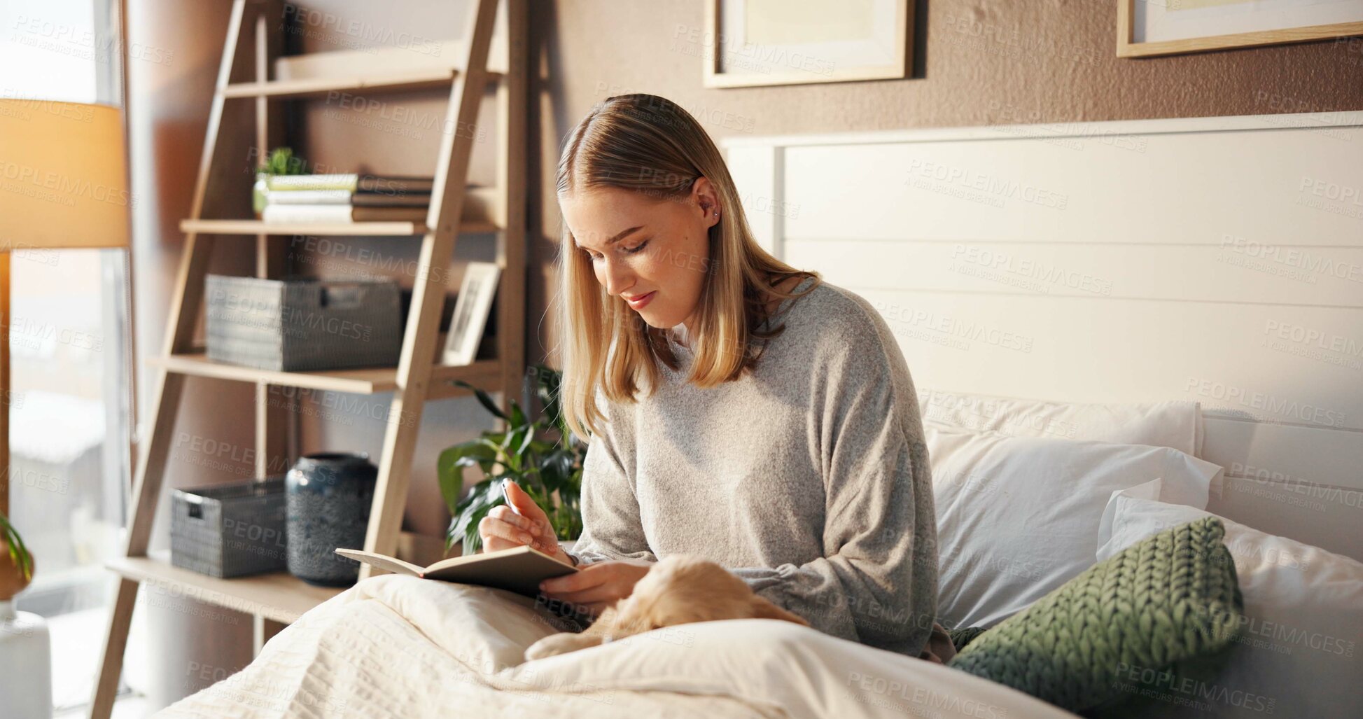 Buy stock photo Happy woman, relax and writer with book in bed for morning inspiration, idea or journal in home. Female person, journalist or copywriter taking notes in bedroom for story, novel or reminder in house