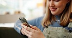 Phone, smile and woman on sofa in home with networking, contact or texting on mobile app. Happy, technology and female person on cellphone for communication, connectivity or social media in house.