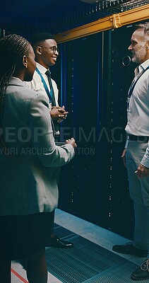 Buy stock photo Happy team, people and talking in server room for system maintenance, diagnostics and planning. Technician group, engineer and discussion with smile in data center for IT support and database update