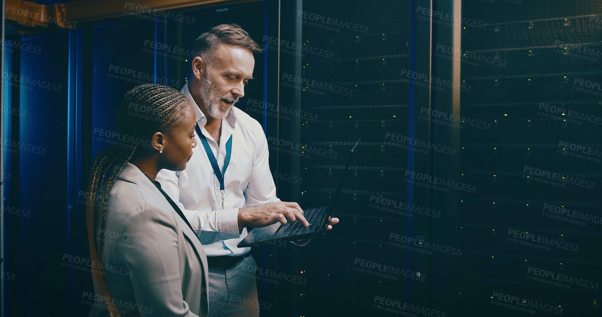 Buy stock photo Laptop, team and people in data center for discussion, system upgrade or IT. Collaboration, computer and engineer in server room for network diagnostics, planning maintenance or training with mentor