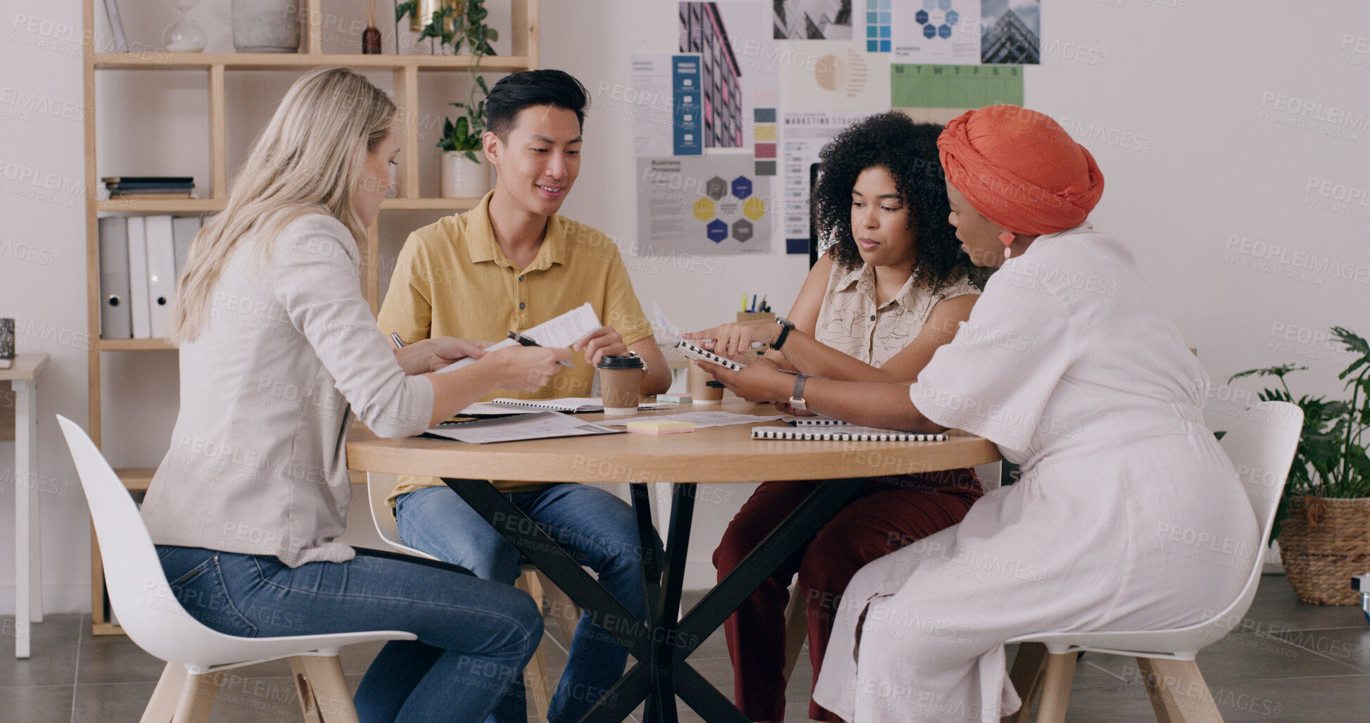 Buy stock photo Meeting, documents and business people in office with creative team for project collaboration or publishing. Discussion, paperwork and editor group with draft for feedback, review or workplace advice