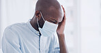 Black man, face mask and headache in hospital with stress, bacteria infection or healthcare crisis. African person, pain and sick with virus in medical clinic for recovery, check up and anxiety