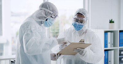 Buy stock photo Scientist, team and clipboard with PPE, discussion and document for medical research or study. People, teamwork and data analysis with test results, biotechnology and protective suit for healthcare