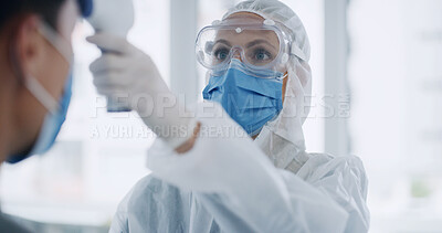 Buy stock photo Doctor, temperature test and PPE with person for consulting, medical symptoms and virus analysis. Pandemic, thermometer and protective suit with patient for healthcare worker, safety and protection