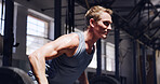 Fitness, gym and man with barbell for row, strength training or workout challenge for wellness. Strong bodybuilder, weight lifting and exercise in health club for power, energy and muscle development