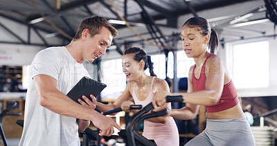 Buy stock photo Man, tablet and talking to people in spin class for fitness record, schedule session and progress. Coach, digital app and tracking for cycling exercise, training performance and workout management