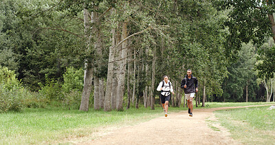 Buy stock photo Running, forest and couple in nature for fitness, exercise and cardio workout together in morning. Sports, hiking trail and man with woman training for wellness, health or challenge outdoor for hobby