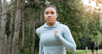 Buy stock photo Woman, running and outdoor for fitness in park, training routine and speed for cardio challenge at sunset. Girl, athlete and perspective for workout, exercise or jog in nature for wellness in summer
