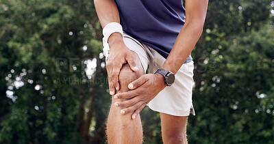 Buy stock photo Fitness, hands and man with knee pain outdoor from sports injury, muscle fatigue and workout strain. PFPS, runner and kneecap dislocation in nature with joint inflammation, exercise sprain and bokeh