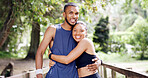 Happy, hug and portrait of couple for fitness, exercise and cardio workout together in morning. Nature, bridge and man with woman embrace for wellness, health and bonding for hobby, training and rest