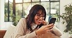 Woman, phone and relax on sofa with smile, contact and texting for online dating in living room. Person, happy and smartphone with mobile app, web chat and check notification on couch at apartment