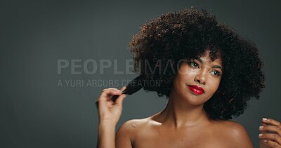 Buy stock photo Afro hair, brush and thinking with black woman on studio space for beauty or cosmetic ideas. Comb, mockup and vision with African model isolated on gray background for haircare results or treatment