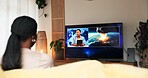 Breaking news, nuclear war and woman watching tv on sofa for live report, global conflict or threat. Screen, back of person or television broadcast of military attack with explosion headlines in home