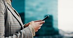 Phone, hands and businesswoman in city with networking, communication or connectivity online. Technology, contact and female corporate employee with cellphone for email on mobile app in urban town.