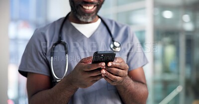 Buy stock photo Hands, doctor and phone with texting in hospital for telehealth, online results or check schedule. Surgeon, man and happy with smartphone in clinic for medical research, healthcare app or mobile chat