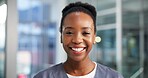 Nurse, woman and happy with portrait in clinic for medical service, healthcare support and integrity. Surgeon, bokeh and black person with smile in hospital for health professional or career ambition