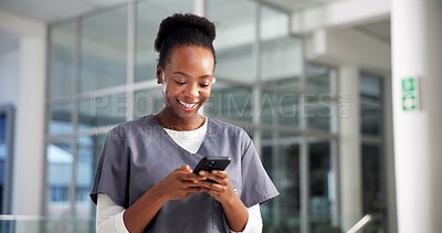 Buy stock photo Smartphone, surgeon and black woman in hospital, healthcare and digital app for online schedule. African person, medical service or nurse in clinic, cellphone and chatting with smile or communication