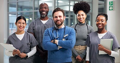 Buy stock photo Doctors, portrait and group with smile, hospital and pride for healthcare service, teamwork or unity. Confident, people and happy for support in clinic, medical professionals and together to help