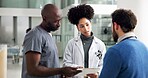 Healthcare, doctors and people with document in hallway, patient care file and discussion of results. Brainstorming, treatment plan and physician consulting for medical advice, ideas and teamwork.