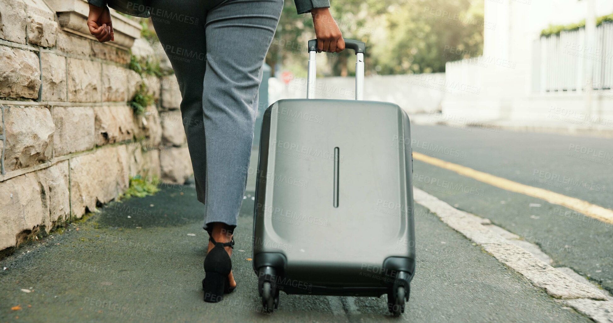 Buy stock photo Business woman, legs or walking with suitcase on sidewalk for commute, travel or journey in city. Female person, employee or moving with luggage for new job, career opportunity or relocation in town