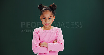 Buy stock photo Portrait, girl and child with arms crossed in studio, assertive and confident pose on mockup space. Pride, freckles and kid with attitude, emoji and determined expression on green background.