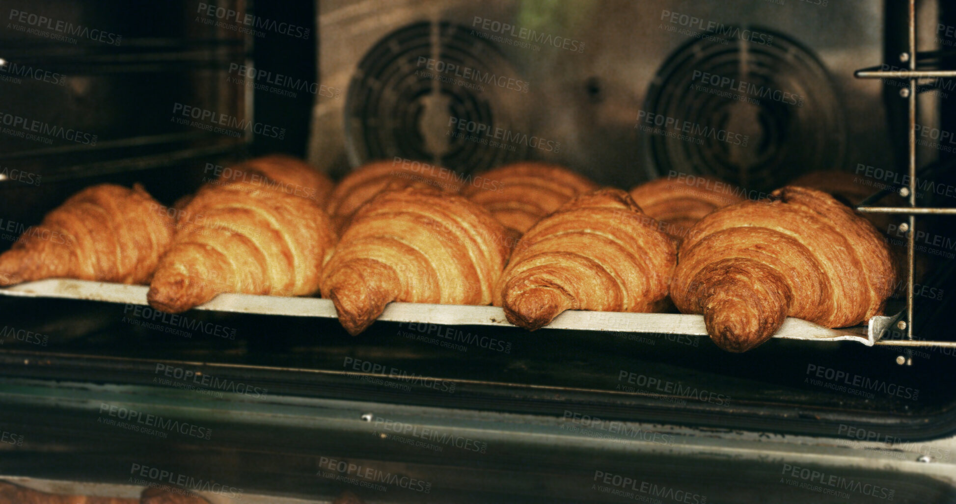 Buy stock photo Bakery, oven and croissants in commercial kitchen with food, cooking and small business. Patisserie, order and quality control for catering, restaurant industry and production for breakfast or snack