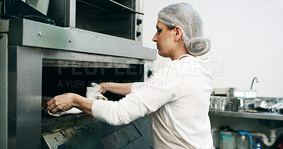 Buy stock photo Restaurant, pastry chef and woman in commercial kitchen with oven, quality control and small business. Baker, order and stock for catering, bakery industry and production for breakfast or snack