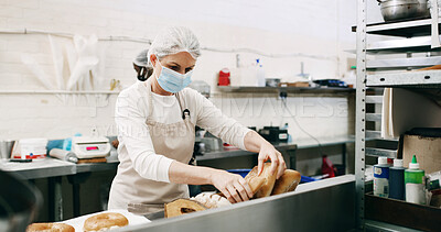 Buy stock photo Bread, baker and cafe with woman in kitchen for cooking, culinary process and food production. Health, wheat and baking with person in coffee shop for catering, restaurant and small business owner