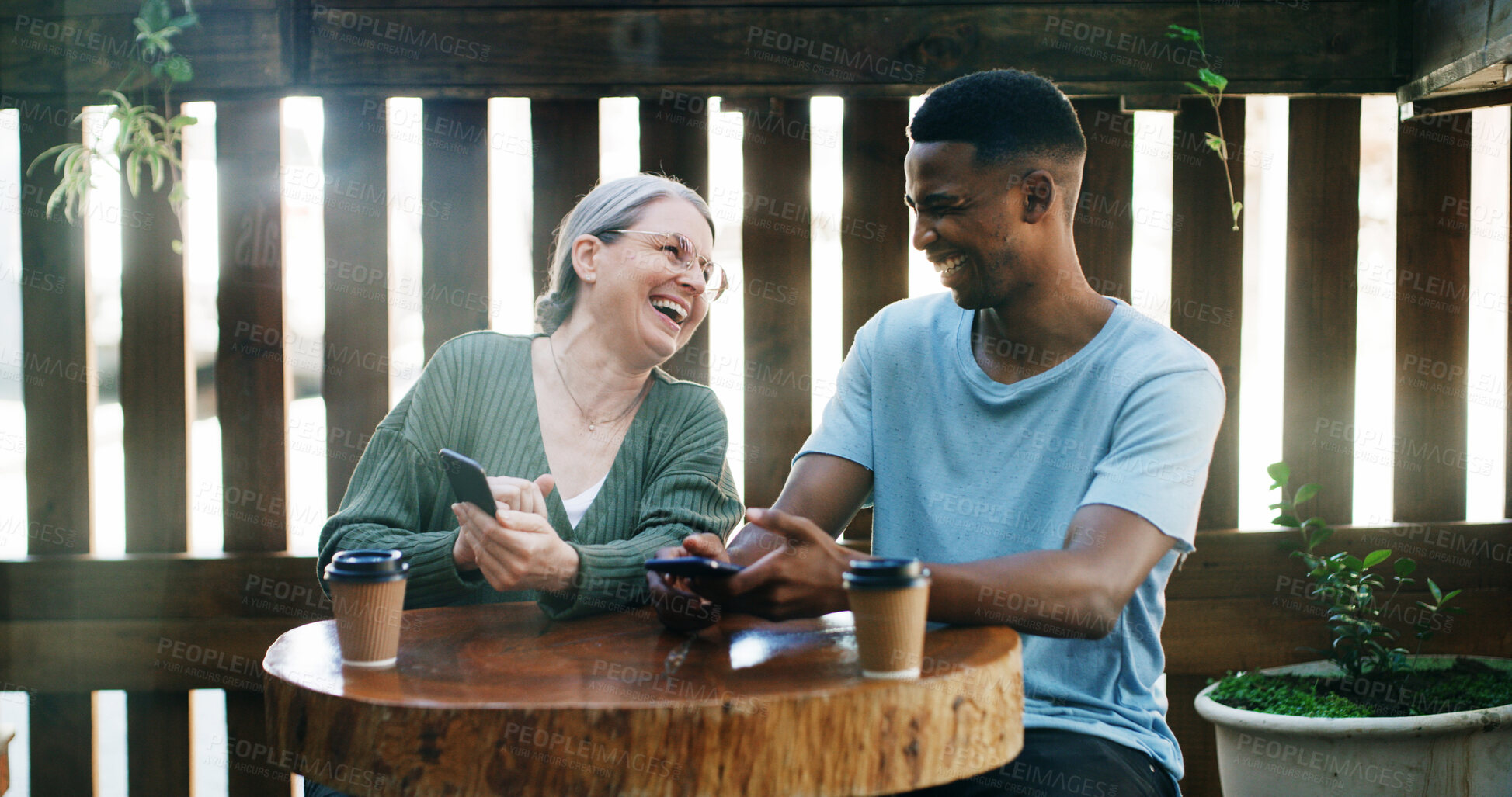 Buy stock photo Cafe, entrepreneur or employee laughing with phone, funny review or online comment for restaurant. Flare, positive feedback or happy people with mobile in coffee shop, reading website or social media