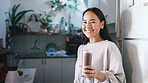 Woman, glass and portrait for smoothie in kitchen, self care or pride for drink, detox or diet at home. Person, milkshake and confident in house with appliance, weight loss or nutrition in Cambodia