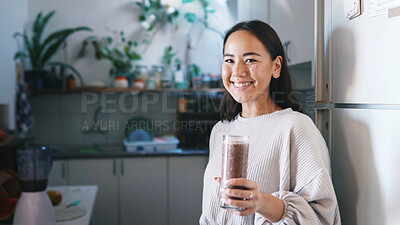 Buy stock photo Woman, glass and portrait for smoothie in kitchen, self care or pride for drink, detox or diet at home. Person, milkshake and confident in house with appliance, weight loss or nutrition in Cambodia