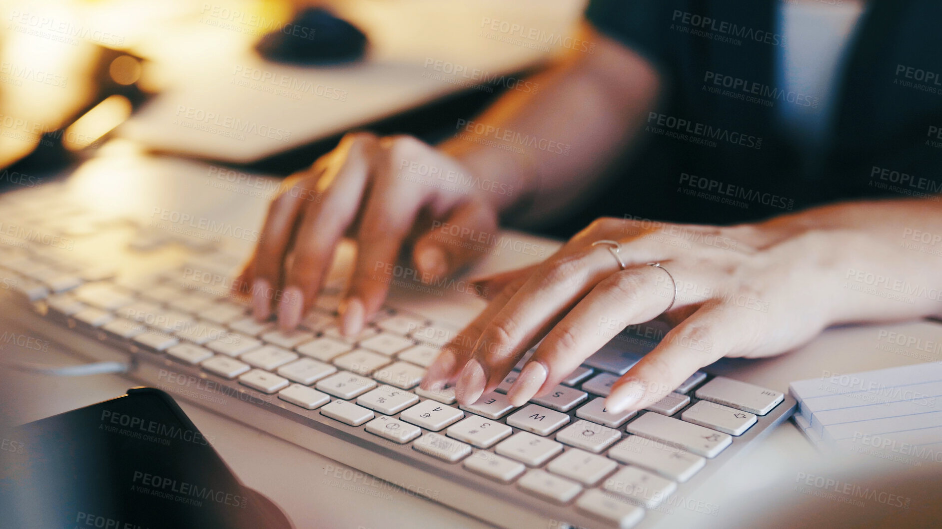 Buy stock photo Hands, typing and person in home office with computer, night and research for remote work. Schedule, planning and freelance woman at keyboard writing article, email or online report with notes