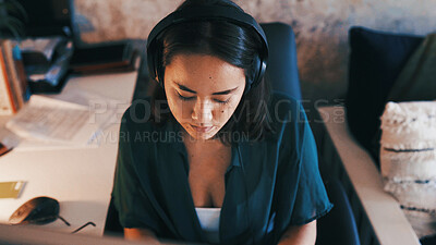 Buy stock photo Remote work, headphones and woman on computer for copywriting, article review and editing. Home, freelancer and above of person with music, audio and sound for research, website content or report
