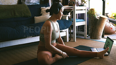 Buy stock photo Home,  online video and woman with laptop, yoga and stretching with fitness, wellness or headphones. Apartment, yogi and person in lounge, computer or virtual course with balance, exercise or pilates