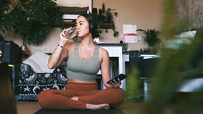 Buy stock photo Drinking water, yoga and exercise with woman, smartphone and hydration with fitness. Home, break and healthy person with cellphone, thirsty and liquid with wellness, detox and rest with internet