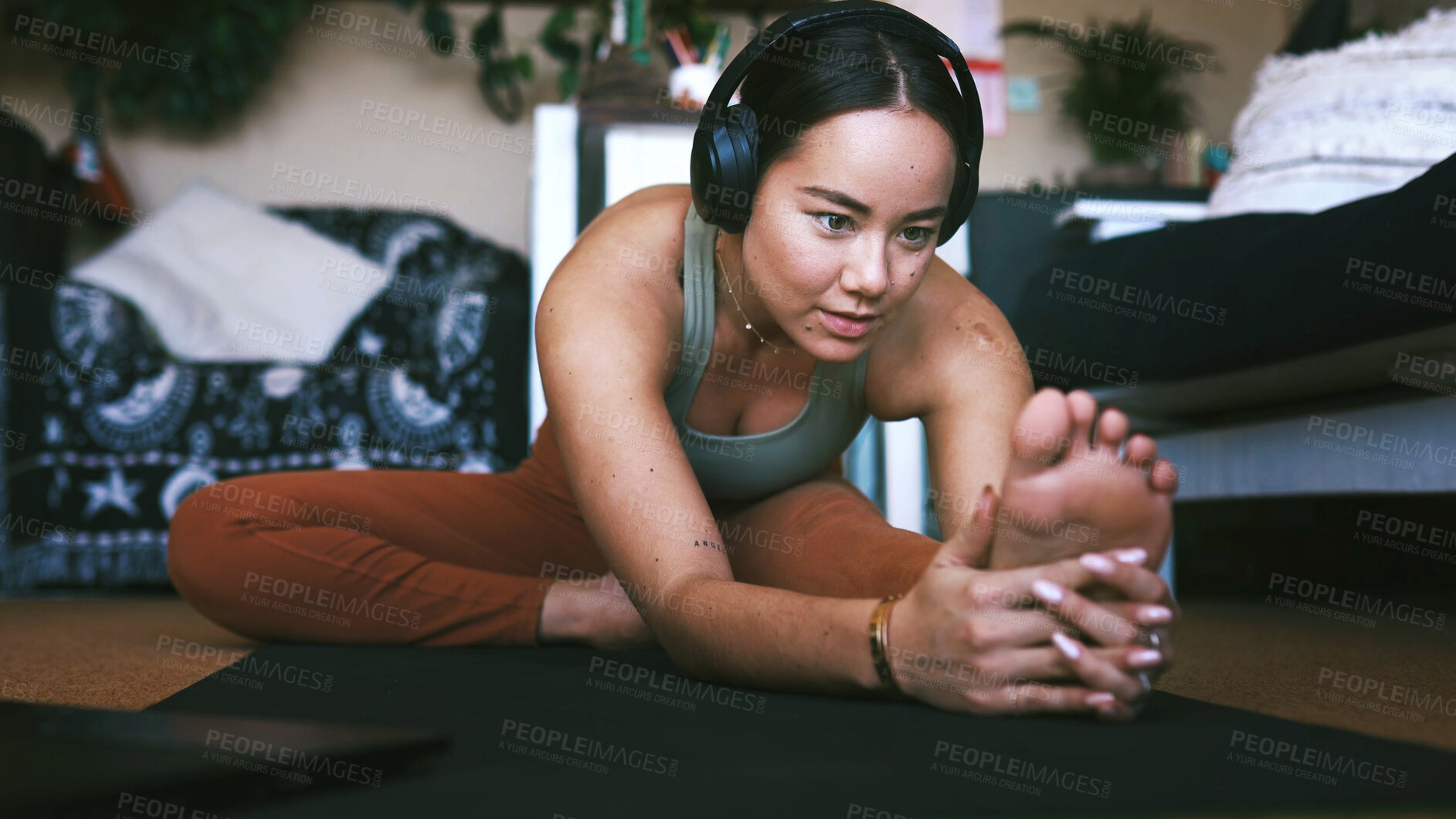 Buy stock photo Laptop, headphones and girl with stretching in home for yoga routine, online class and fitness. Yogi, woman and listening to virtual lesson on mat for muscle preparation, warm up and start exercise