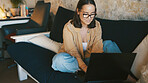 Student, laptop and reading with woman on sofa for college essay, online course and research thesis. University assignment, scholarship application and online with person in living room of home
