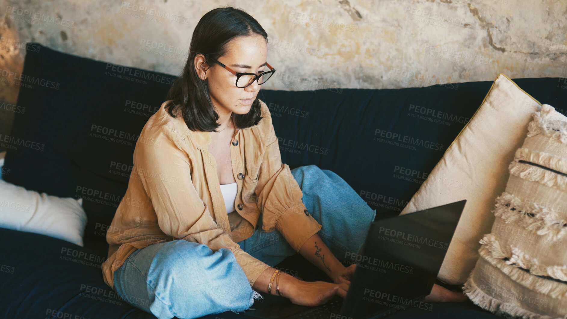 Buy stock photo Creative, woman and typing with laptop, lounge and reporter with article on website and remote work. Online, news and person with tech for freelance project, journalism and planning for story in home
