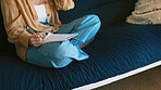Writing, notes and hands in lounge, creative and planning for novel on couch, inspiration and ideas. Home, writer and person with notebook for brainstorming, relax and artist with project on sofa