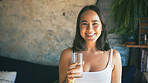 Happy, woman and glass with water in home for liquid hydration, natural nutrients and body detox. Space, person and portrait with fresh beverage in apartment for refreshing drink, thirsty or wellness