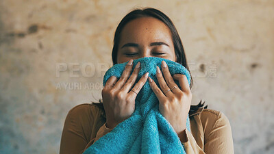 Buy stock photo Cleaning, smell and towel with woman in home laundry for chores, duty or responsibility. Fragrance, fresh linen and satisfaction with happy person in apartment for housekeeping or hygiene results