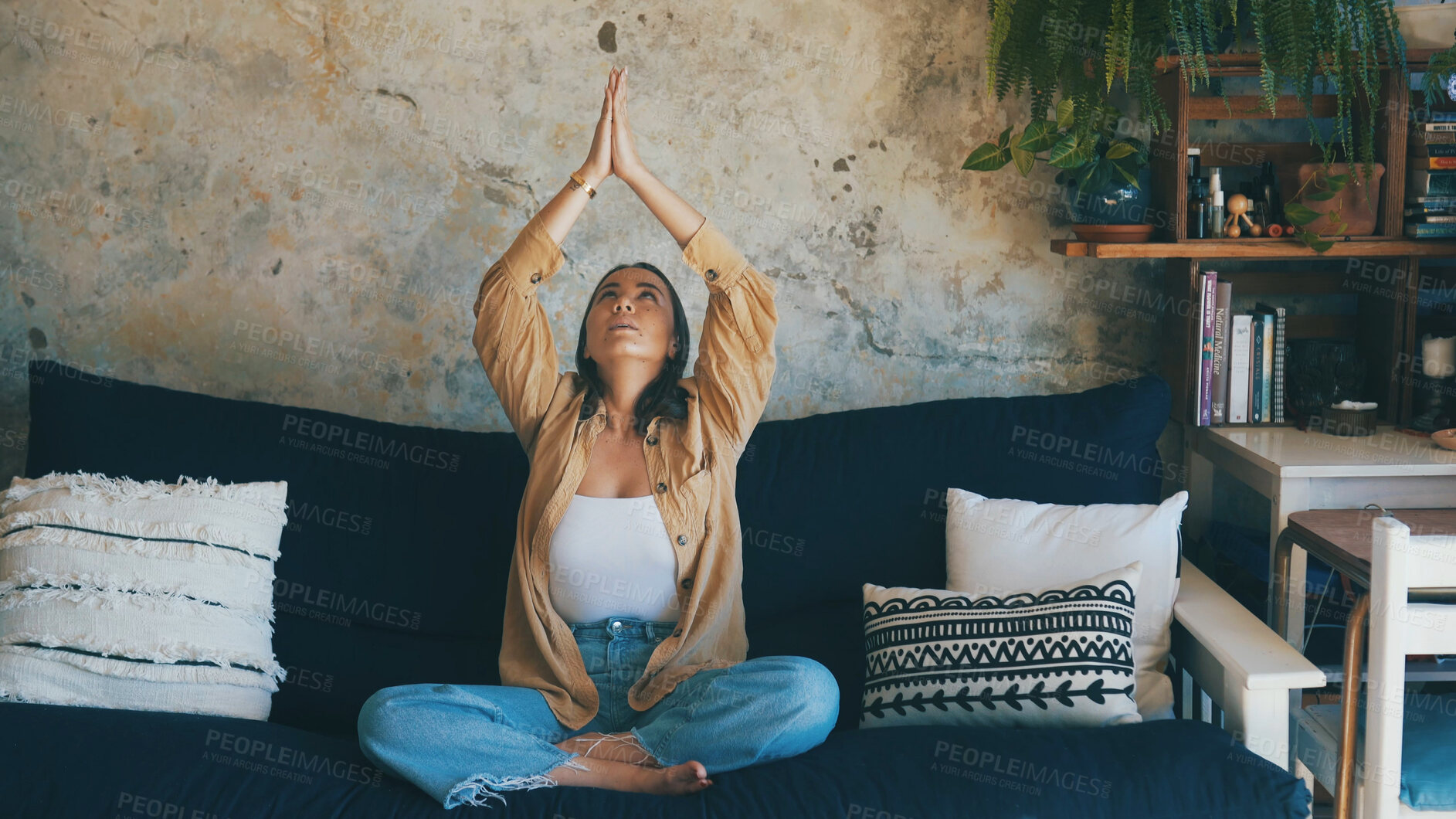Buy stock photo Meditation, prayer hands and woman on sofa in home for mindfulness, spiritual wellness and zen. House, morning ritual and person with relax, calm and peace for healing, balance and chakra on couch