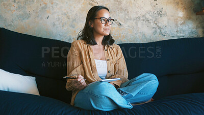 Buy stock photo Writing, notes and woman in lounge, thinking and planning for novel on couch, inspiration and ideas. Home, writer and person with notebook for brainstorming, relax and artist with project on sofa